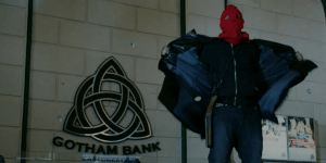The red hood ties the outfit all together.